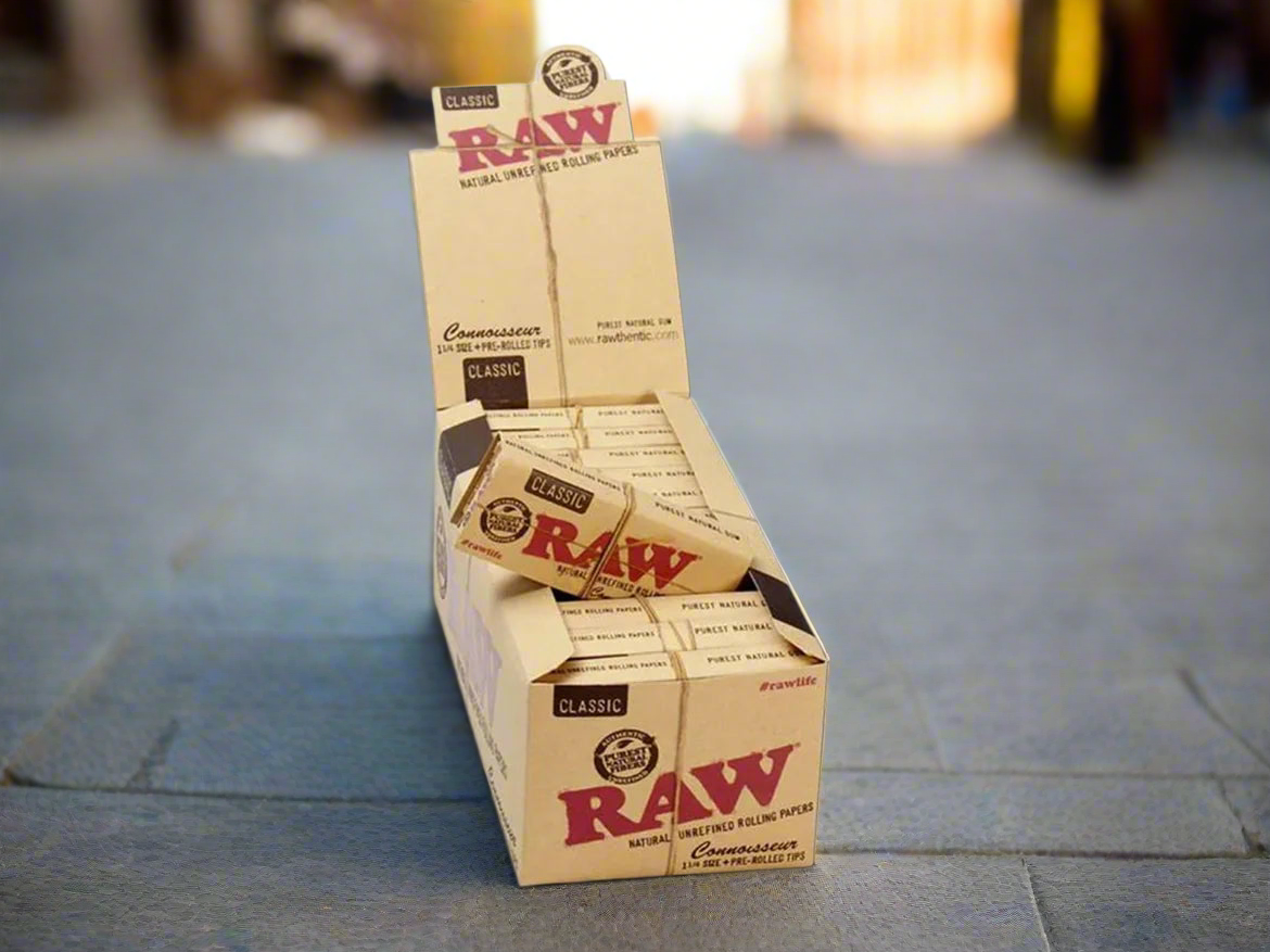 Raw Connoisseur 1 1/4 Size Rolling Papers + Pre Rolled Tips