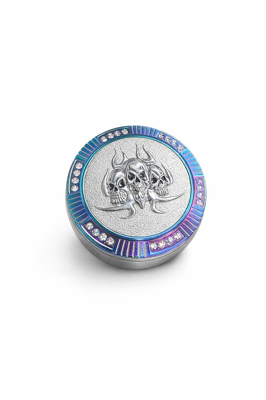 Four‑piece metal grinder on a pure white background, showing its layered design and durable metallic finish.