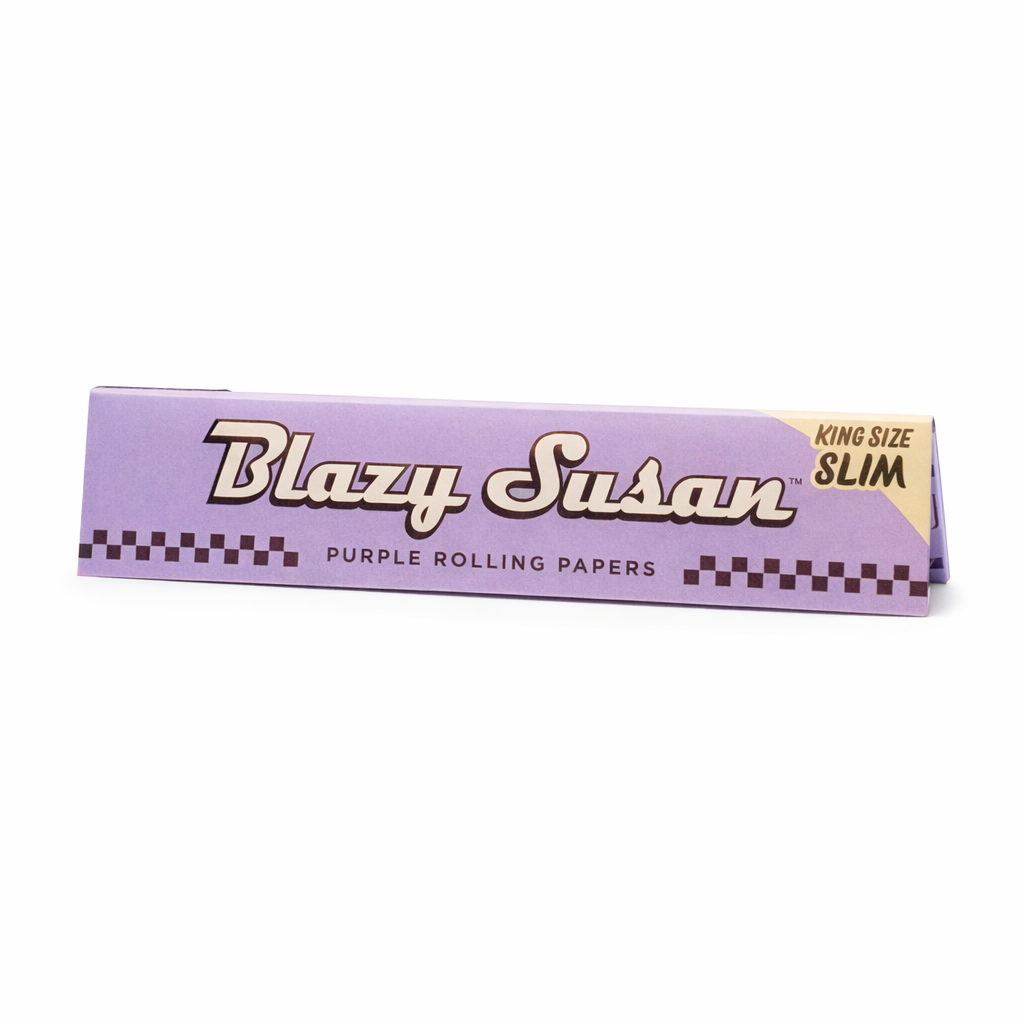 Blazy Susan King Size Slim rolling papers single pack shown in purple branded packaging on a pure white background.