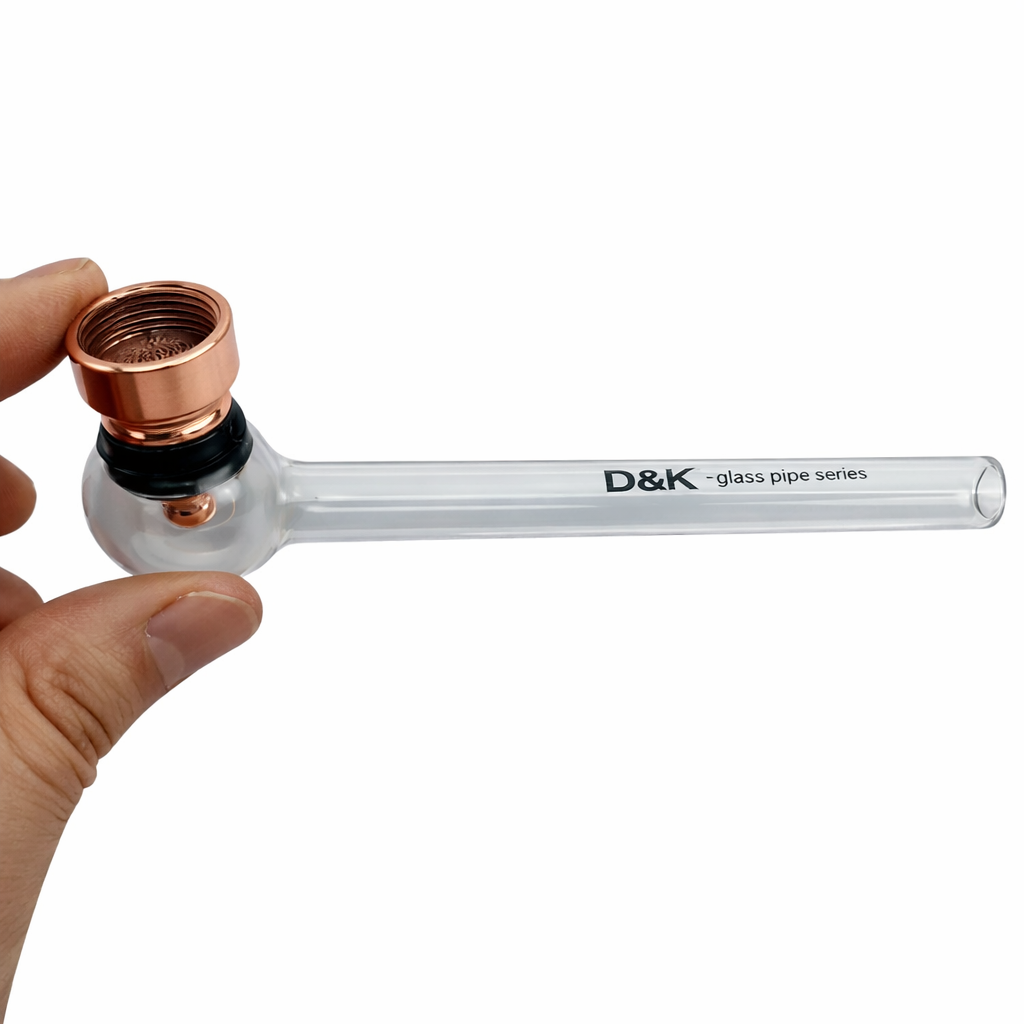 Clear D&K glass hand pipe with transparent stem and rounded bowl displayed on a pure white background.