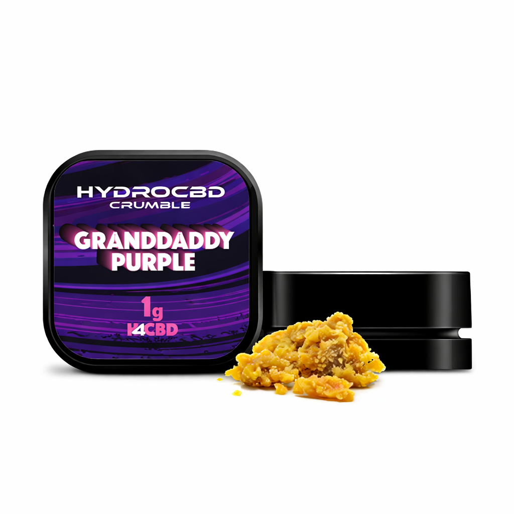 Crumble container with golden crumble concentrate displayed on a pure white background.
