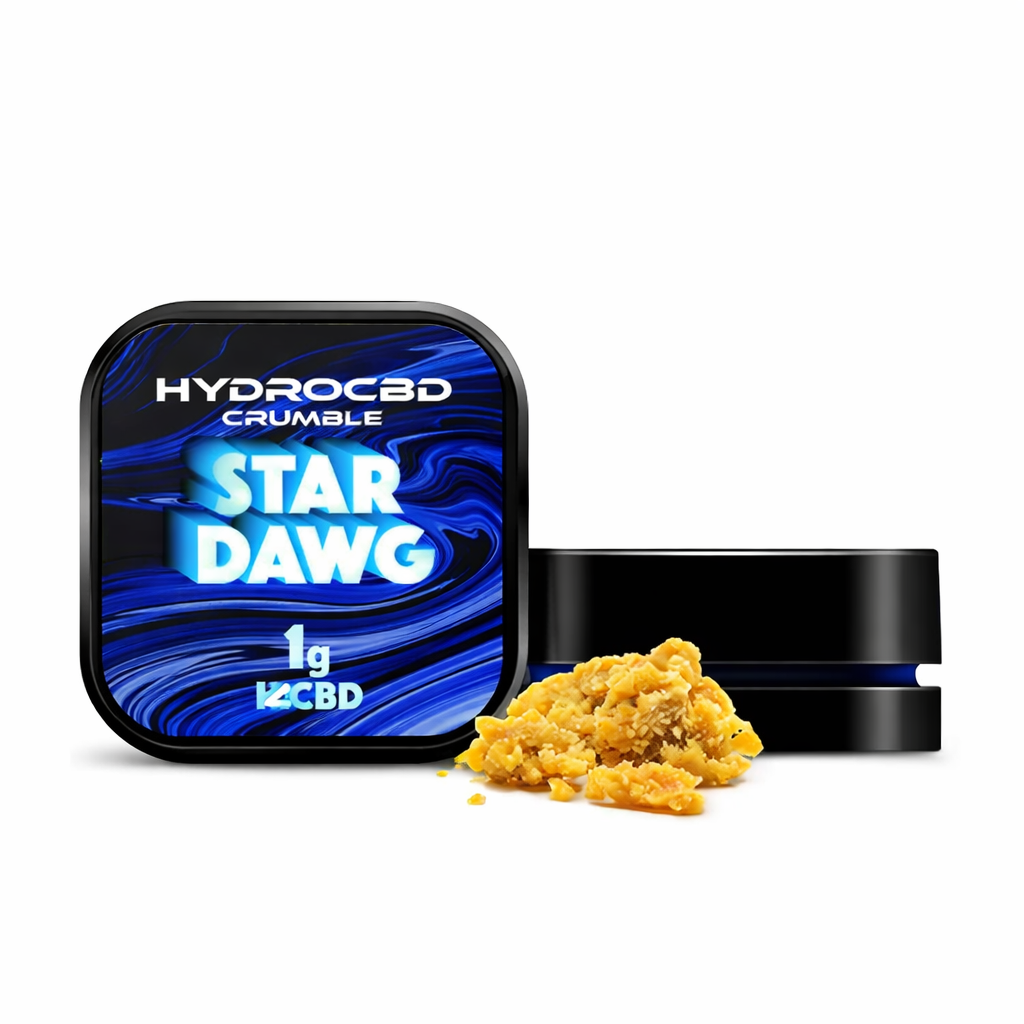 Crumble container with golden crumble concentrate displayed on a pure white background.