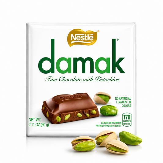 Nestle Damak chocolate packaging with pistachios on a pure white background.