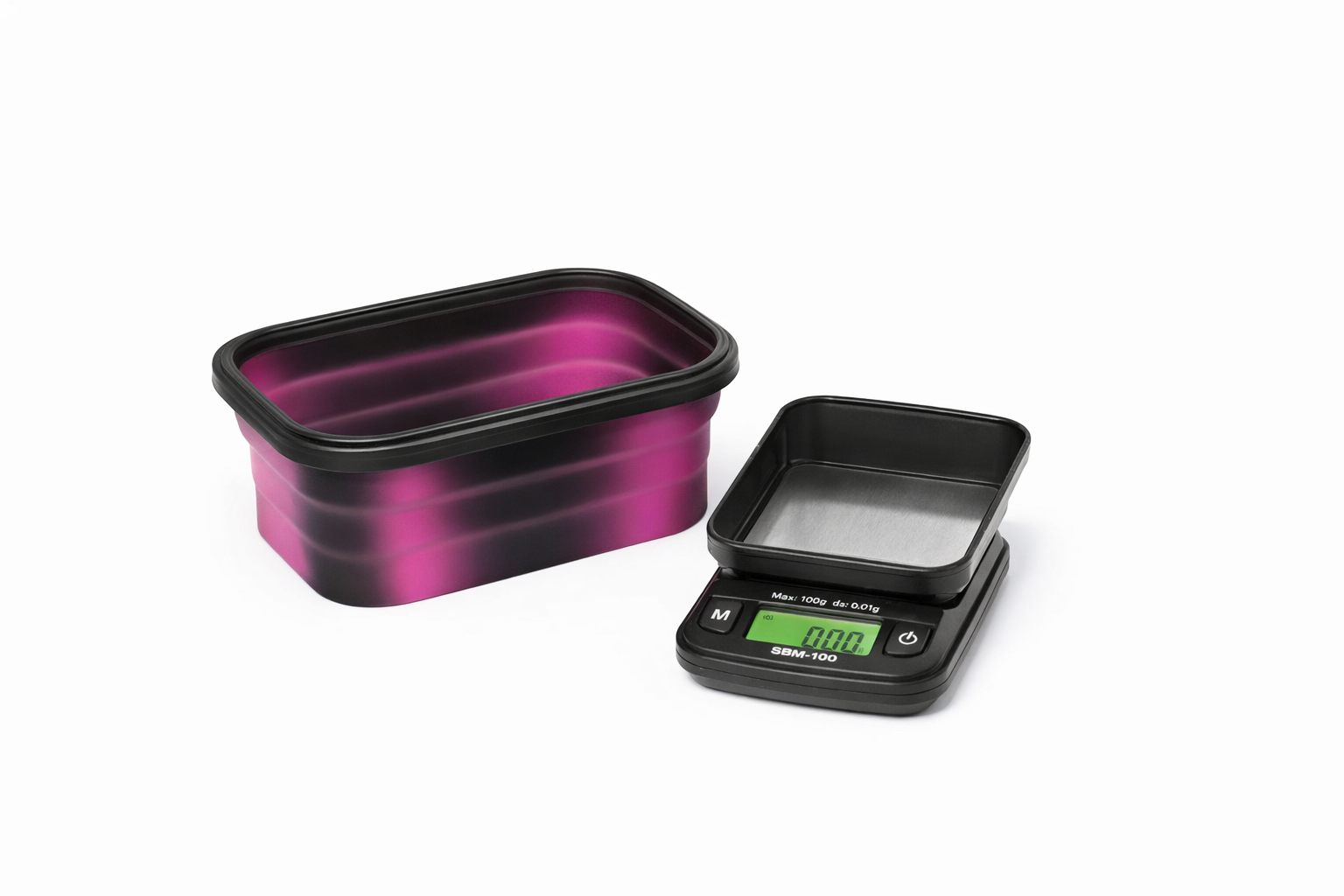On Balance SBM 100 Mini Digital Pocket Weighing Scale shown in compact black housing with clear digital display on a pure white background.