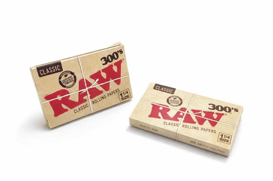 RAW Classic 300s rolling papers pack with natural brown finish displayed on a pure white background.