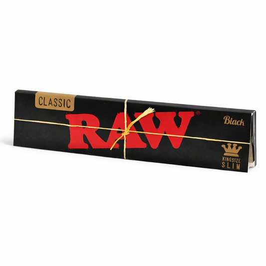 RAW Black King Size rolling papers pack with matte black branding displayed on a pure white background.