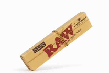 Raw Connoisseur Classic rolling papers with tips pack displayed on a clean white background in a centred product layout.