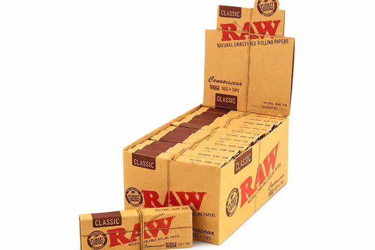 RAW Connoisseur Single Wide rolling papers with tips, full box of 24 in natural‑brown branded packaging displayed on a pure white background.