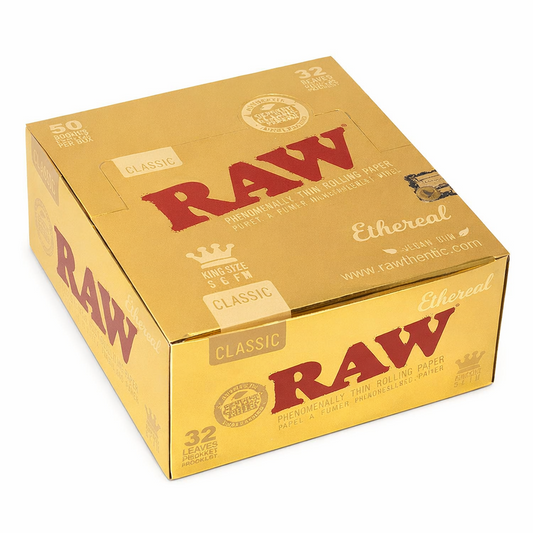 RAW Ethereal King Size Slim rolling papers full box in gold branded packaging displayed on a pure white background.