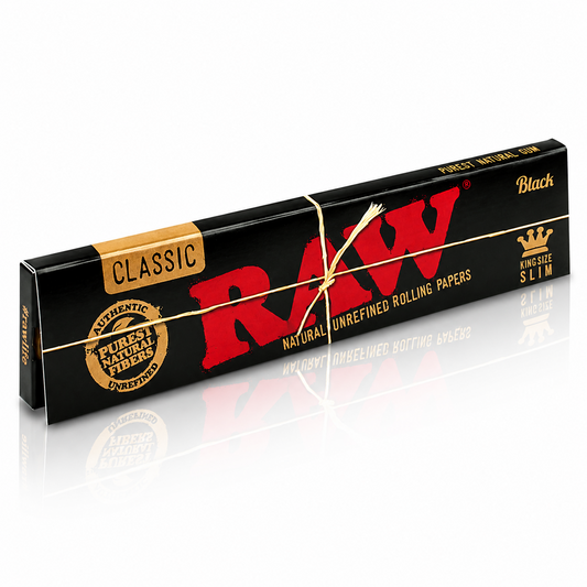 RAW Black King Size rolling papers pack with matte black branding displayed on a pure white background.