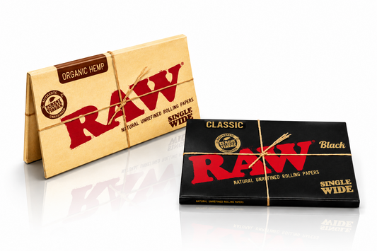 RAW single wide rolling papers in branded packaging displayed on a pure white background.