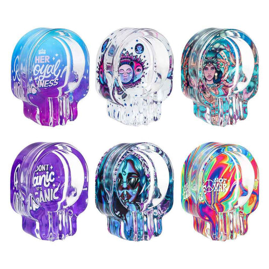 Set of six colorful skull-shaped figures with various designs and text on a white background.